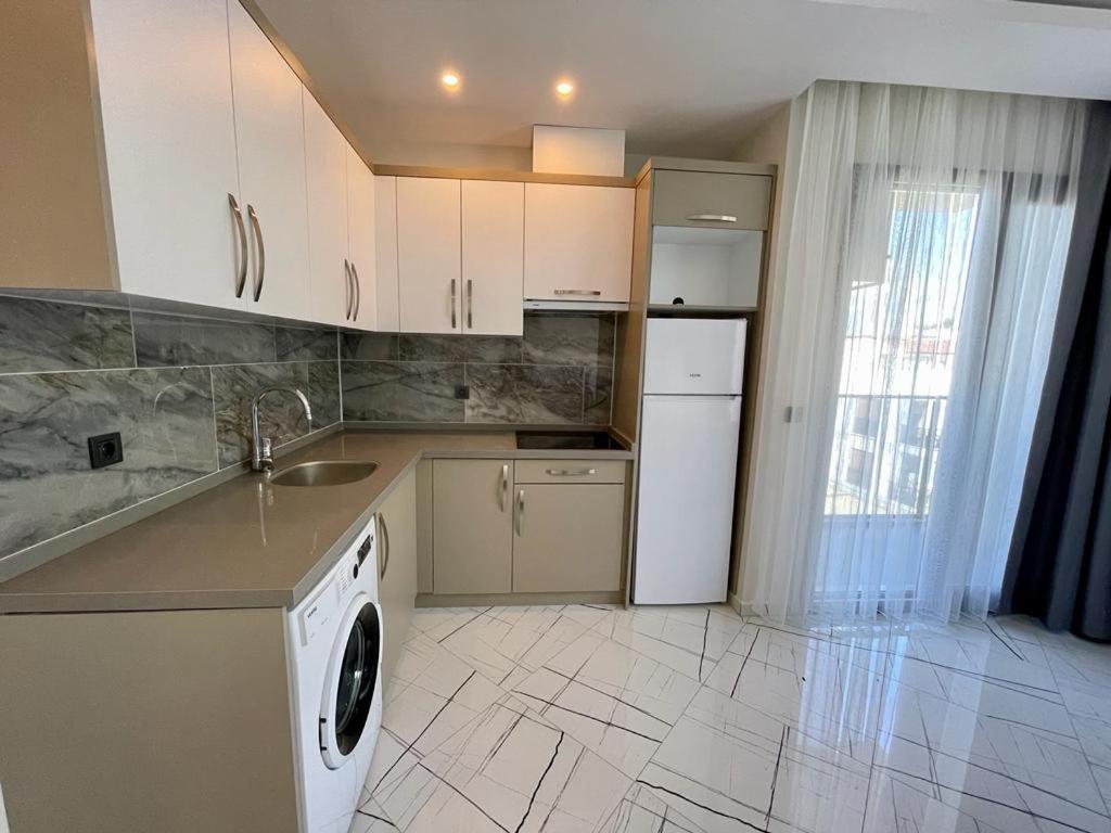 Lotus Apart Apartamento Kusadası Exterior foto